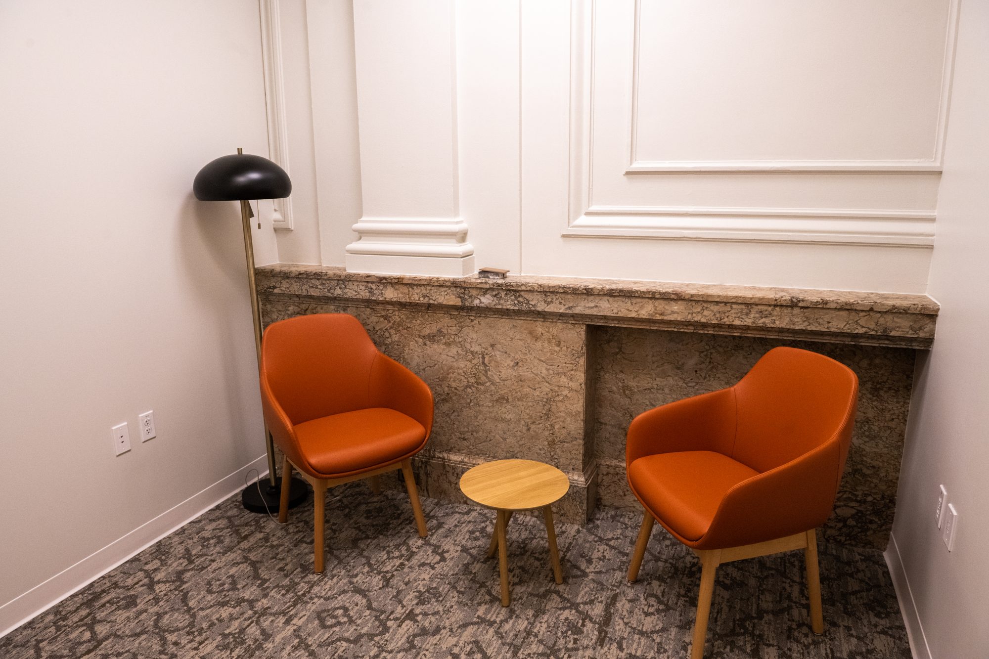 Lounge with the original marble sill and new seating