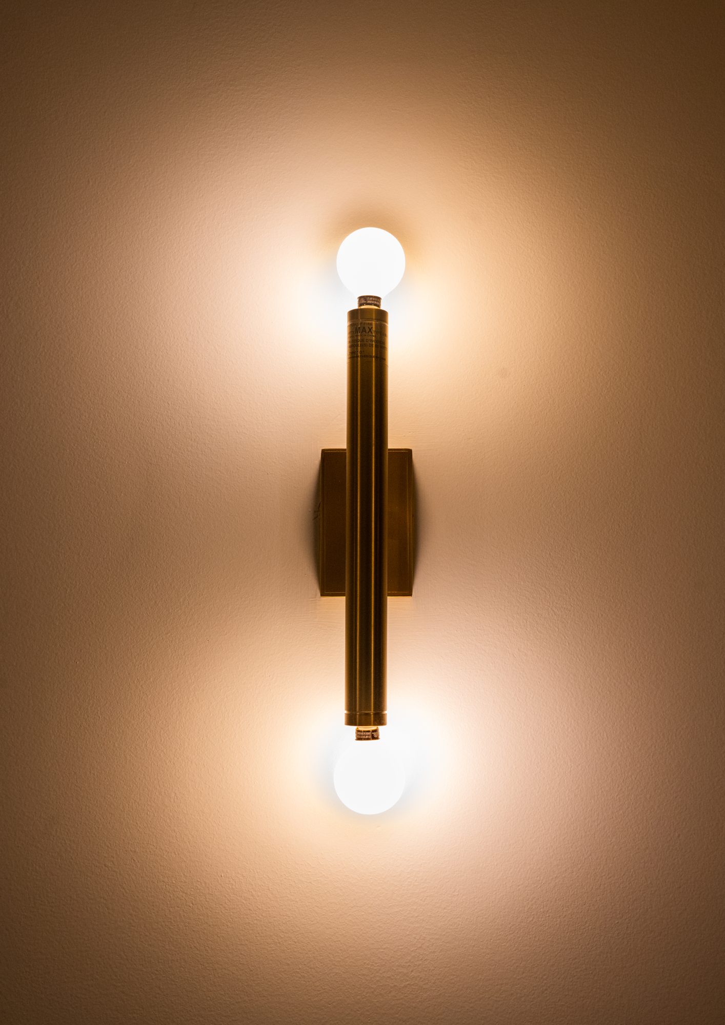 New brass sconces throughout