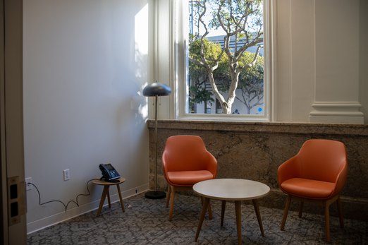 Seating nook with stone wainscot at 601 Clement St
